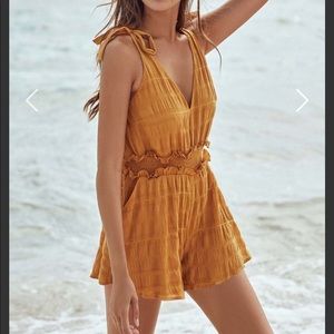 Yellow Romper XS never worn